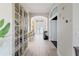 Inviting foyer with tiled floors and decorative shelving at 3707 5Th Ne Ave, Bradenton, FL 34208