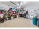 Spacious garage with epoxy flooring for storage, workspace, and organization opportunities at 3707 5Th Ne Ave, Bradenton, FL 34208