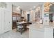 Bright kitchen features stainless steel appliances, large center island, and quartz countertops at 3707 5Th Ne Ave, Bradenton, FL 34208