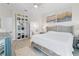 Main Bedroom features an ensuite bathroom, custom closet, and decor at 3707 5Th Ne Ave, Bradenton, FL 34208
