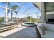 Spacious patio featuring outdoor seating, a hot tub, and beautiful canal views at 3707 5Th Ne Ave, Bradenton, FL 34208