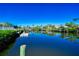 Waterfront with docked boats and canals, offering serene views and boating opportunities at 3707 5Th Ne Ave, Bradenton, FL 34208
