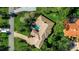 An aerial view showcasing the stunning home, sparkling pool, and meticulously landscaped yard at 402 Walls Way, Osprey, FL 34229