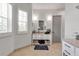Bright bathroom features a double vanity, and large window for an abundance of natural light at 402 Walls Way, Osprey, FL 34229