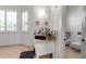 Bright bathroom features a single vanity and view into separate room with toilet and bidet at 402 Walls Way, Osprey, FL 34229