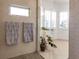 Bright shower features a mosaic tile floor and glass door and a window for an abundance of natural light at 402 Walls Way, Osprey, FL 34229
