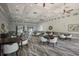 Spacious community room featuring ample seating, tables, and stylish decor for resident gatherings and events at 4134 63Rd E Ter, Sarasota, FL 34243