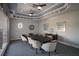 Professional conference room with a large table, comfortable chairs, and stylish decor at 4134 63Rd E Ter, Sarasota, FL 34243