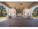Grand entrance featuring stately columns and beautiful pavers, offering a luxurious welcome at 4134 63Rd E Ter, Sarasota, FL 34243
