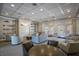Bright library featuring built-in bookshelves, soft seating, and natural light at 4134 63Rd E Ter, Sarasota, FL 34243