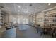 Cozy library with bookshelves, comfortable seating, and a peaceful ambiance at 4134 63Rd E Ter, Sarasota, FL 34243