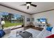Cozy living room featuring a lake view, hardwood floors, and comfortable seating at 4134 63Rd E Ter, Sarasota, FL 34243