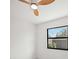 Bedroom featuring a ceiling fan and window at 4444 Robin Hood Trl W, Sarasota, FL 34232
