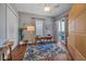 Stylish office space with custom built-ins, neutral paint, and sliding glass doors to the lanai at 4510 Murcia Blvd # 16, Sarasota, FL 34238