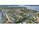 Beautiful aerial view of canal-front homes with private docks in a desirable waterfront community at 4624 Blue Marlin Dr, Bradenton, FL 34208
