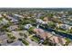 Stunning aerial view highlighting the waterfront home with a private pool and well-manicured landscaping at 4624 Blue Marlin Dr, Bradenton, FL 34208