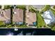 Aerial view featuring screened pool and boat dock, highlighting waterfront living at 4624 Blue Marlin Dr, Bradenton, FL 34208