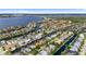 Scenic aerial showcasing a waterfront neighborhood with numerous homes along canals and waterways at 4624 Blue Marlin Dr, Bradenton, FL 34208