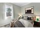 Cozy bedroom with large window and minimalist decor at 4624 Blue Marlin Dr, Bradenton, FL 34208
