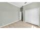 Another cozy bedroom featuring wood-look flooring and a large closet at 4624 Blue Marlin Dr, Bradenton, FL 34208