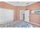 Bedroom features a closet and modern TV at 4624 Blue Marlin Dr, Bradenton, FL 34208