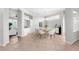 Bright dining room featuring modern chandelier, and views to the living room at 4624 Blue Marlin Dr, Bradenton, FL 34208