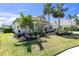 Stunning home with manicured lawn, lush landscaping, and beautiful curb appeal at 4624 Blue Marlin Dr, Bradenton, FL 34208