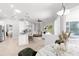 Open concept living space with a modern kitchen, living room and dining area at 4624 Blue Marlin Dr, Bradenton, FL 34208