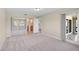 This bedroom features mirrored closet doors and access to a bathroom for added convenience at 5201 Lake Village Dr # 14, Sarasota, FL 34235