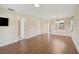 The living room offers wood floors and an open view into the kitchen at 5201 Lake Village Dr # 14, Sarasota, FL 34235