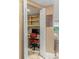 Small office space with built-in desk and shelving, perfect for a home office at 600 Sutton Pl # 104, Longboat Key, FL 34228
