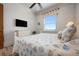 Bedroom with coastal decor and water view at 606 Crestwood Ln, Holmes Beach, FL 34217