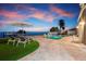 Relax by the pool with waterfront views at 606 Crestwood Ln, Holmes Beach, FL 34217