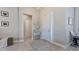 Inviting foyer with decor and a view of the home's interior at 6172 Lungo Lago Dr, Sarasota, FL 34241