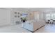 Comfortable living area with a media console and stylish decor at 6172 Lungo Lago Dr, Sarasota, FL 34241