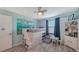 A themed bedroom with bright walls, light floors, bunk beds and a ceiling fan at 6410 Rosehill Farm Run, Bradenton, FL 34211