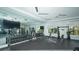 Fully equipped fitness center featuring weights, machines, and mirrored walls for a comprehensive workout at 6410 Rosehill Farm Run, Bradenton, FL 34211