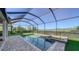 Screened-in pool and jacuzzi with patio area; perfect for outdoor relaxation and entertainment in a private backyard at 6410 Rosehill Farm Run, Bradenton, FL 34211