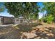 Large backyard provides an outdoor seating area and screen porch at 6639 16Th N St, St Petersburg, FL 33702