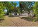 Spacious backyard featuring mature trees and lots of shade at 6639 16Th N St, St Petersburg, FL 33702