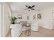 Bright living room with modern furniture, recessed lighting, ceiling fan, and white walls at 6639 16Th N St, St Petersburg, FL 33702