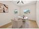 Office featuring modern furniture, neutral walls, recessed lighting, and two large windows at 6639 16Th N St, St Petersburg, FL 33702