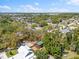 Birds-eye view of a charming home, enveloped by lush greenery in a vibrant neighborhood setting at 6811 6Th W St, Bradenton, FL 34207