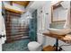 Unique bathroom with wood framed glass shower, vessel sink and natural textures at 6811 6Th W St, Bradenton, FL 34207