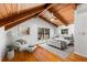 Bedroom featuring hardwood floors, vaulted wood ceilings and windows for natural light at 6811 6Th W St, Bradenton, FL 34207