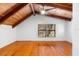 Bedroom with vaulted wood ceilings and shining wood floors, window and ceiling fan at 6811 6Th W St, Bradenton, FL 34207