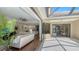 Open-concept living area connects to the kitchen, featuring hardwood floors at 6915 Honeysuckle Trl, Lakewood Ranch, FL 34202