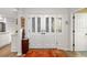 Beautiful entrance with double doors and hardwood flooring at 7713 Fairway Woods Dr # 902, Sarasota, FL 34238