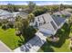 Expansive aerial view of the property showcasing its lush landscaping and well-maintained surroundings at 826 Oak Briar Ln, Osprey, FL 34229