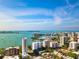 Stunning aerial view of Sarasota coastline with bays and boats under a clear blue sky at 826 Oak Briar Ln, Osprey, FL 34229